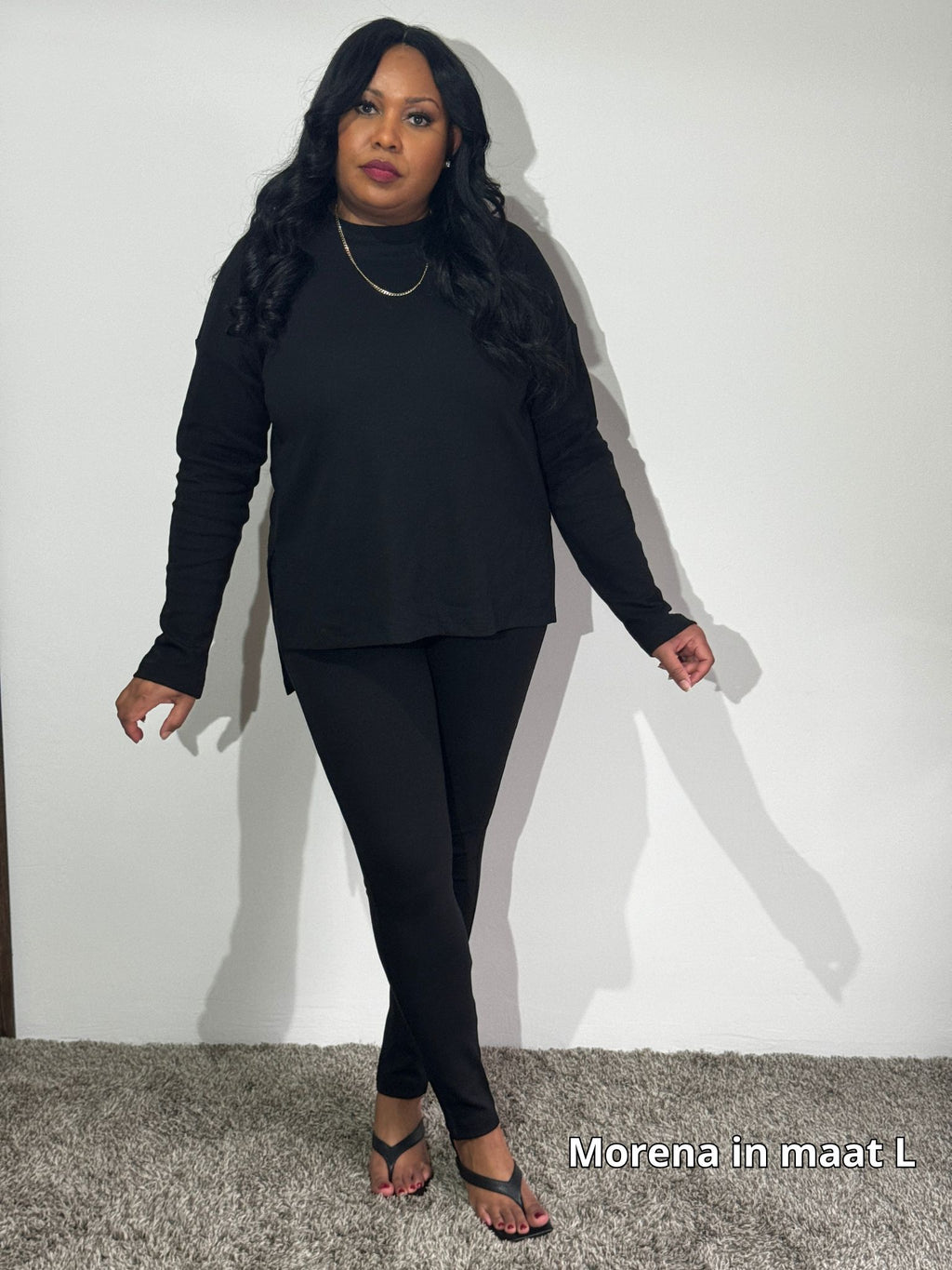 Plussize dameskleding set in zwart met wijdvallende top en legging
