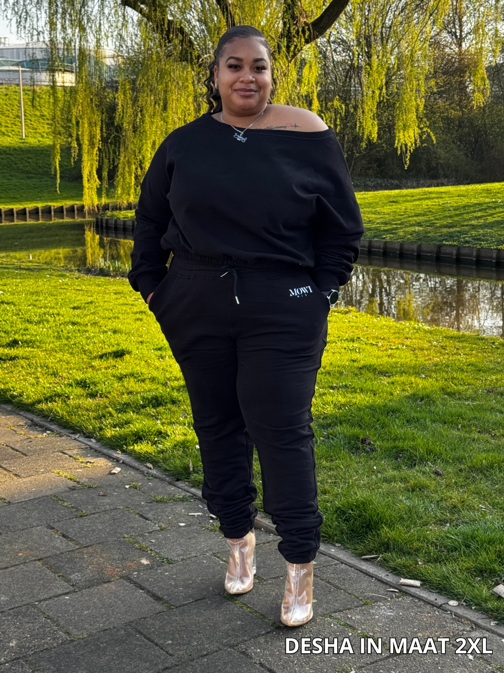 Off-shoulder joggingpak voor dames in zwart met comfortabele pasvorm plussize
